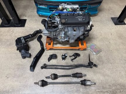 Minty D16A6 Si complete swap with a built trans Good compression numbers.